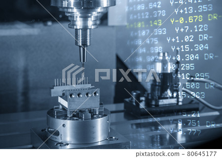 The abstract scene CNC milling machine cutting the EDM parts with G-code data background. The abstract scene CNC milling machine cutting the EDM parts with G-code data background. 80645177