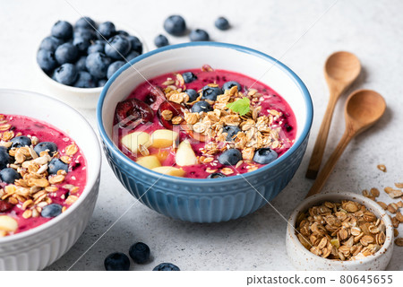 Healthy superfood blueberry smoothie bowl 80645655