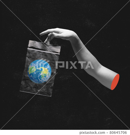 Creative artwork. Human bw hand holding plastic package with the Earth inside . Concept of saving planet from plastic trash. Creative artwork. Human bw hand holding plastic package with the Earth inside . Concept of saving planet from plastic trash. 80645706