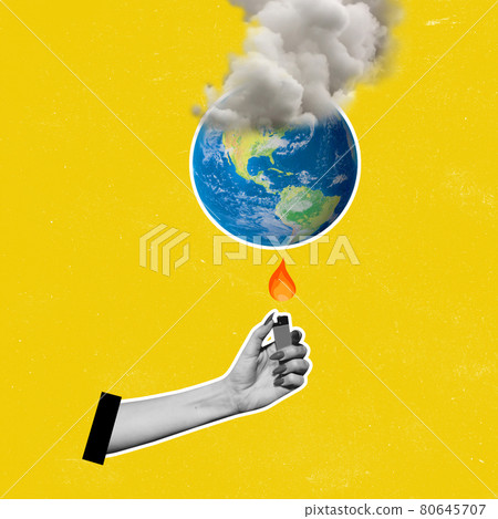 Creative artwork. Female bw hand holding lighter, igniting the Earth in smoke . Concept of saving planet from fire. Creative artwork. Female bw hand holding lighter, igniting the Earth in smoke . Concept of saving planet from fire. 80645707