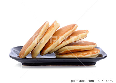 pancakes  on black plate on white background 80645879