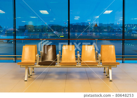 Empty passenger seat in Departure lounge 80648253