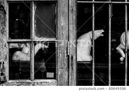 Old dirty Window of an abandoned house with focus on smashed pane Halloween Background 80649306