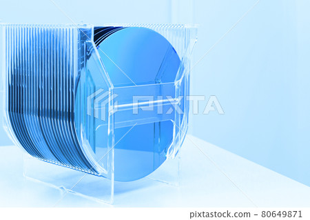 Silicon Wafers in plastic storage box in clear room of semiconductor foundry. 80649871