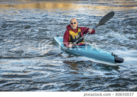 senior male paddler kayaking 80650037