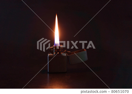 Black background oil lighter and its flames Black background oil lighter and its flames 80651070