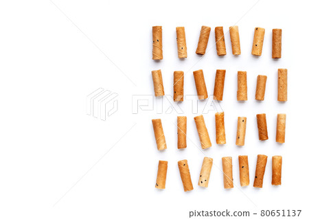 Thai crispy coconut rolls on white Thai crispy coconut rolls on white 80651137