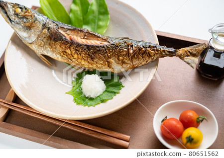Grilled whole mackerel with salt Grilled whole mackerel with salt 80651562
