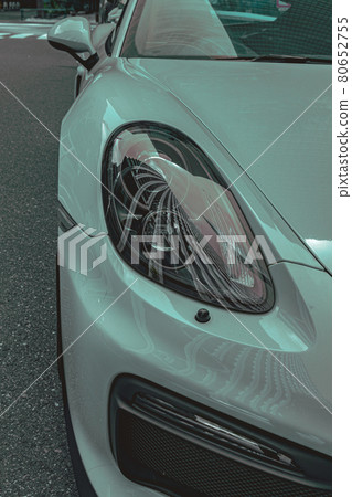 Sports car seen from the headlights 80652755