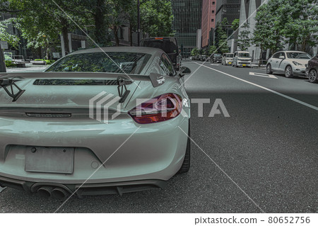 Sports car seen from the tail lamp parked 80652756