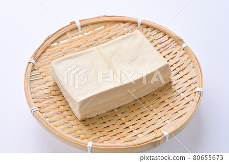 "Cotton tofu for stir-fry" in a drained state. "Cotton tofu for stir-fry" in a drained state. 80655673