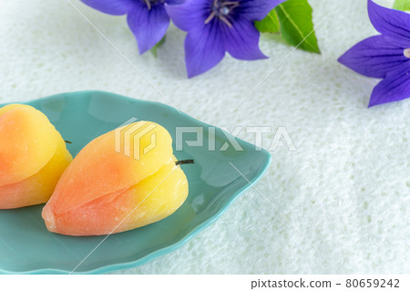 Japanese sweets of Hozuki and flowers of Japanese bellflower 80659242