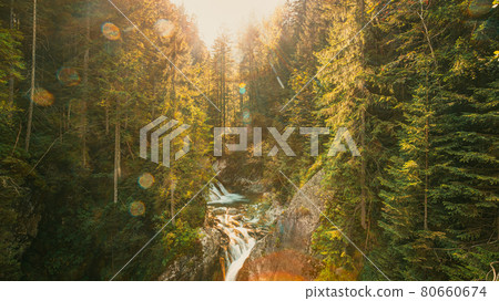 Tatra National Park, Poland. Waterfall Wodogrzmoty Mickiewicza In Summer Mountains Sunset Landscape. Sunlight Through Trees In Tatras. European Nature. UNESCO Tatra National Park, Poland. Waterfall Wodogrzmoty Mickiewicza In Summer Mountains Sunset Landscape. Sunlight Through Trees In Tatras. European Nature. UNESCO 80660674