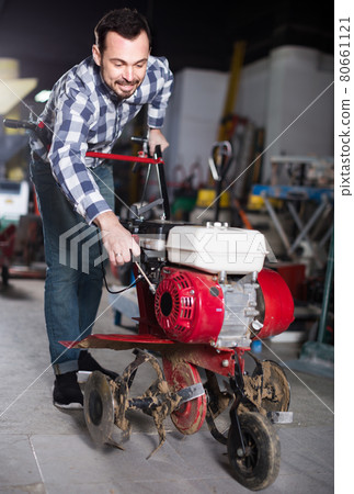 Worker practicing his skills with plough at workplace Worker practicing his skills with plough at workplace 80661121