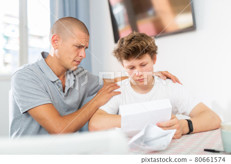 Father and son have recieved letter 80661574