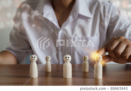 Human resources and recruiting business or team leader management concepts. Hand adult Asian man holding of people icon leadership community on wooden doll. HR Human employee, social networking, Human resources and recruiting business or team leader management concepts. Hand adult Asian man holding of people icon leadership community on wooden doll. HR Human employee, social networking, 80663845