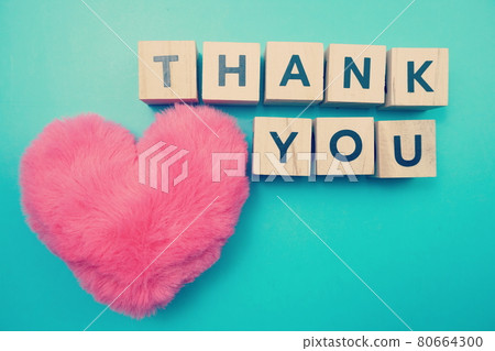 Thank You alphabet letters with space copy on blue background Thank You alphabet letters with space copy on blue background 80664300