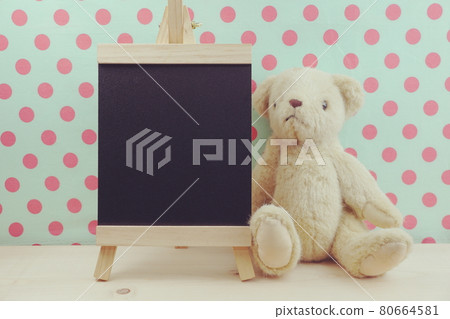 teddy bear and blackboard wooden space background teddy bear and blackboard wooden space background 80664581