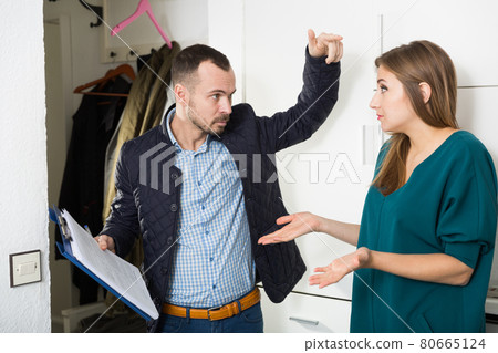 Angry householder visiting upset girl Angry householder visiting upset girl 80665124