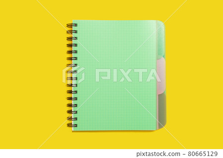 green spiral notebook. school and office accessories 80665129