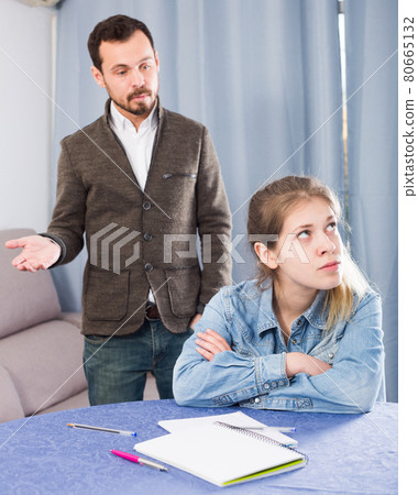 Father and daughter arguing Father and daughter arguing 80665132
