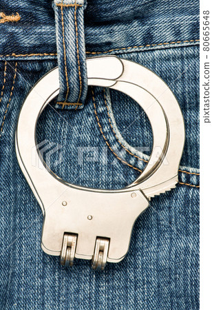 Handcuffs on jeans Handcuffs on jeans 80665648