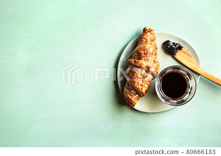 Croissant with Black Coffee 80666183