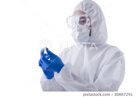 Health worker man with a protective suit and gloves holding covid 19 vaccines 80667291