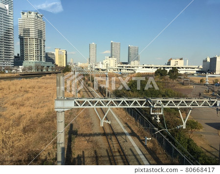Buildings, pampas grass and freight lines Buildings, pampas grass and freight lines 80668417
