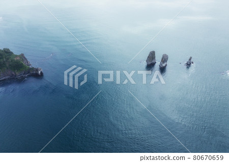 Three Brothers is a famous landmark in the Avacha Bay. Kamchatka Peninsula, Russia Three Brothers is a famous landmark in the Avacha Bay. Kamchatka Peninsula, Russia 80670659