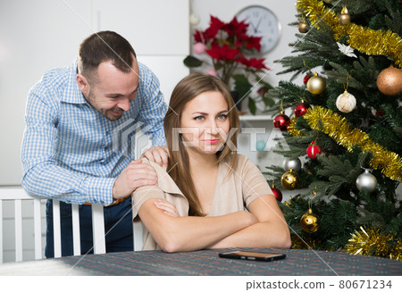 Man asking for forgiveness his wife 80671234