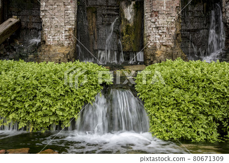 Stream in an abandoned 19th century building 80671309