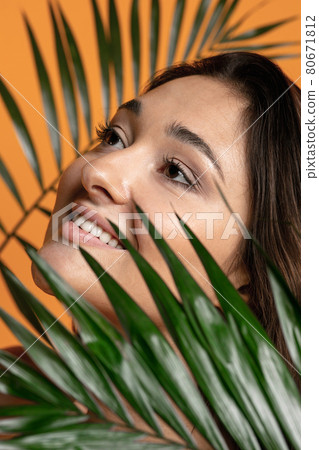 Happy smiling positive plus size woman. Face close up. Pretty caucasian female model at studio. Concept of beauty, body, skin care 80671812