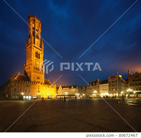 Belfry tower and Grote markt square in Bruges, Belgium on dusk in twilight Belfry tower and Grote markt square in Bruges, Belgium on dusk in twilight 80672467
