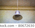 Illustrated image of a bell hanging in the house, warding off ghosts and evil spirits 80672630