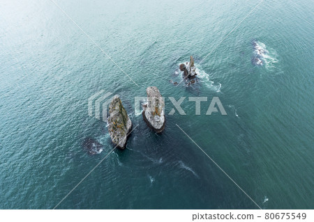 Three Brothers is a famous landmark in the Avacha Bay. Kamchatka Peninsula, Russia Three Brothers is a famous landmark in the Avacha Bay. Kamchatka Peninsula, Russia 80675549