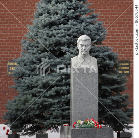 The monument IV Stalin at the Kremlin wall. Moscow The monument IV Stalin at the Kremlin wall. Moscow 80676544