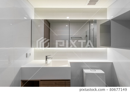 White Modern Bathroom with Big mirror in Apartment. 80677149