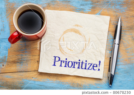 prioritize - reminder on a napkin 80678230