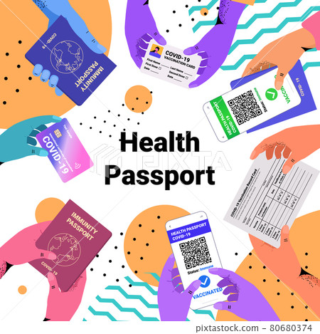 hands holding international certificates of vaccination digital immunity passportson risk free covid-19 pandemic hands holding international certificates of vaccination digital immunity passportson risk free covid-19 pandemic 80680374