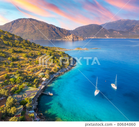 Aerial view of beautiful yachts and boats on the sea at sunset Aerial view of beautiful yachts and boats on the sea at sunset 80684860