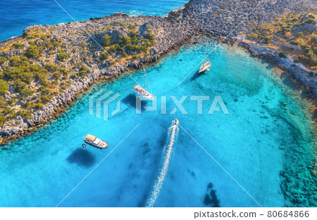 Aerial view of beautiful yachts and boats on the sea at sunset 80684866