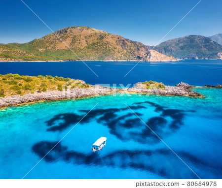 Aerial view of beautiful alone yacht on the sea at sunset Aerial view of beautiful alone yacht on the sea at sunset 80684978