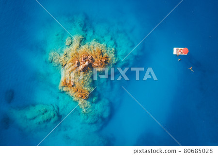 Boat in blue sea at sunset in summer. Aerial view 80685028