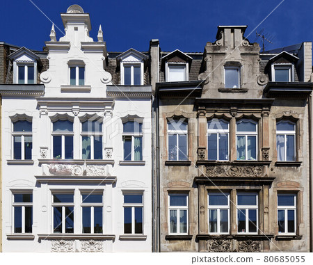 renovated and not renovated old building renovated and not renovated old building 80685055