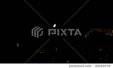 crescent moon in the night sky 80688549