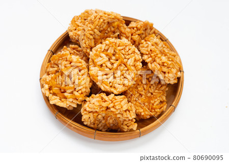 Rice cracker with coconut palm sugar on white 80690095