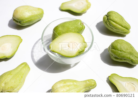 Fresh chayote fruit on white background. Fresh chayote fruit on white background. 80690121