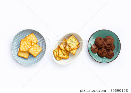Biscuits with cookies on white background. Biscuits with cookies on white background. 80690128