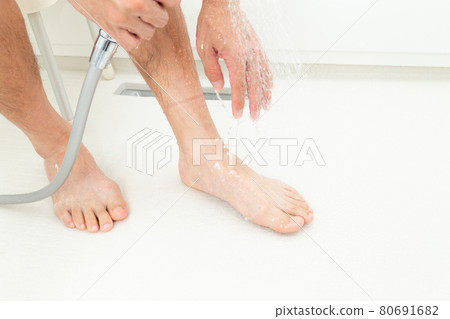 Men washing their feet Men washing their feet 80691682